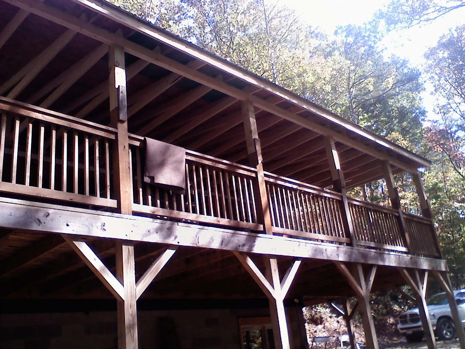 Timber framing under a new elevated porch and deck — Roof Leak Repair in Boonsboro by Roofing Brothers